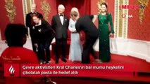 Çevre aktivistleri Kral Charles'ın bal mumu heykelini çikolatalı pasta ile hedef aldı