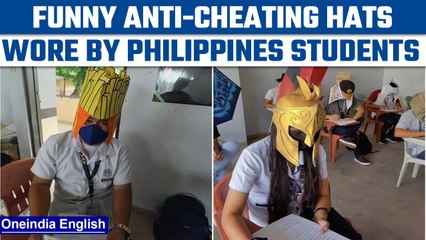 Video herunterladen: Philippines students wear funny ‘anti-cheating’ hats, pics went viral | Oneindia News *News