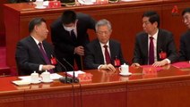 Footage shows moments before Hu Jintao led out of Chinese Communist Party congress