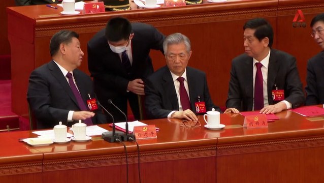 Footage shows moments before Hu Jintao led out of Chinese Communist Party congress