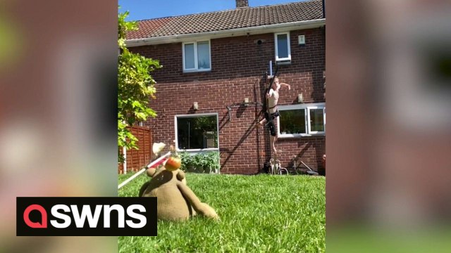 Dad combines pole-dancing and archery to perform incredible stunts, never missing his target
