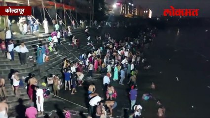 सूर्यग्रहणानिमित्त नदीवर स्नानासाठी भाविकांची गर्दी