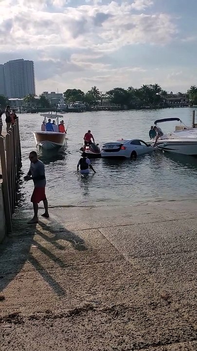 Car Drives into Water at Boat Ramp Almost Sinking Car