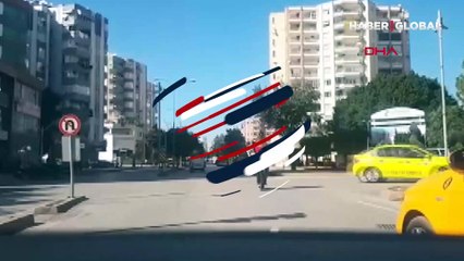 Tepkilere neden oldu! Bebek kucakta scooter'a binen iki kişinin tehlikeli yolculuğu kamerada