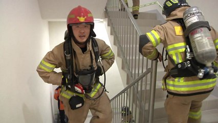 101층 쉬지 않고 오른 소방관들..."구조하는 마음으로" / YTN