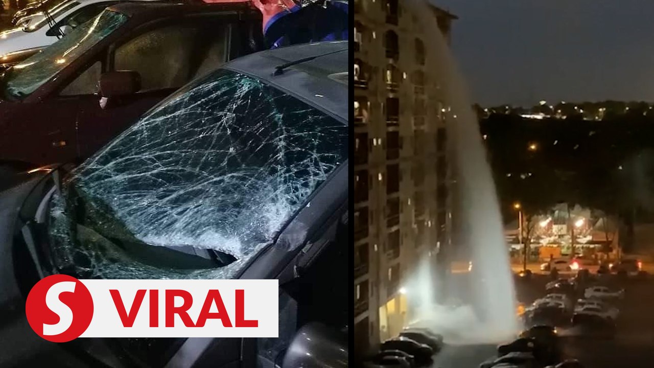 Sepang apartment water tank bursts, six vehicles damaged