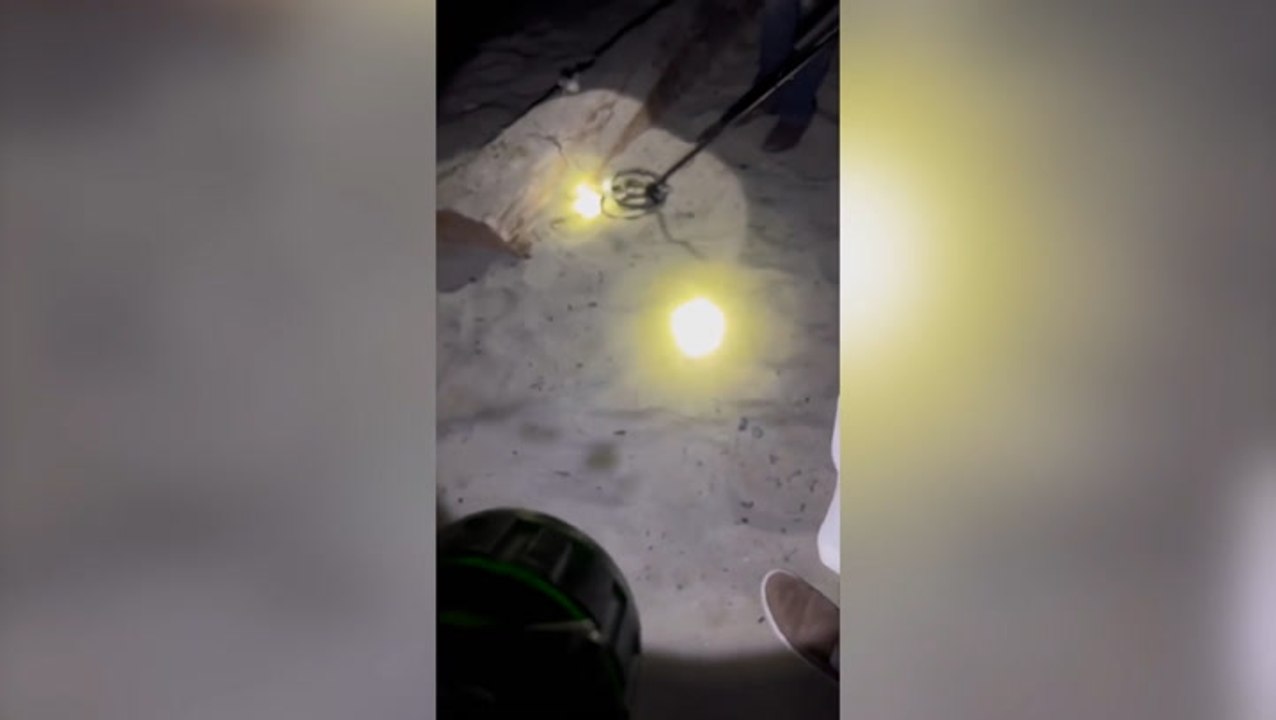 Panicked couple race the tide to find engagement ring after proposal photoshoot mishap