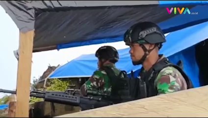 Скачать видео: Siaga KKB Papua, Prajurit TNI AD Menyamar di Semak-semak