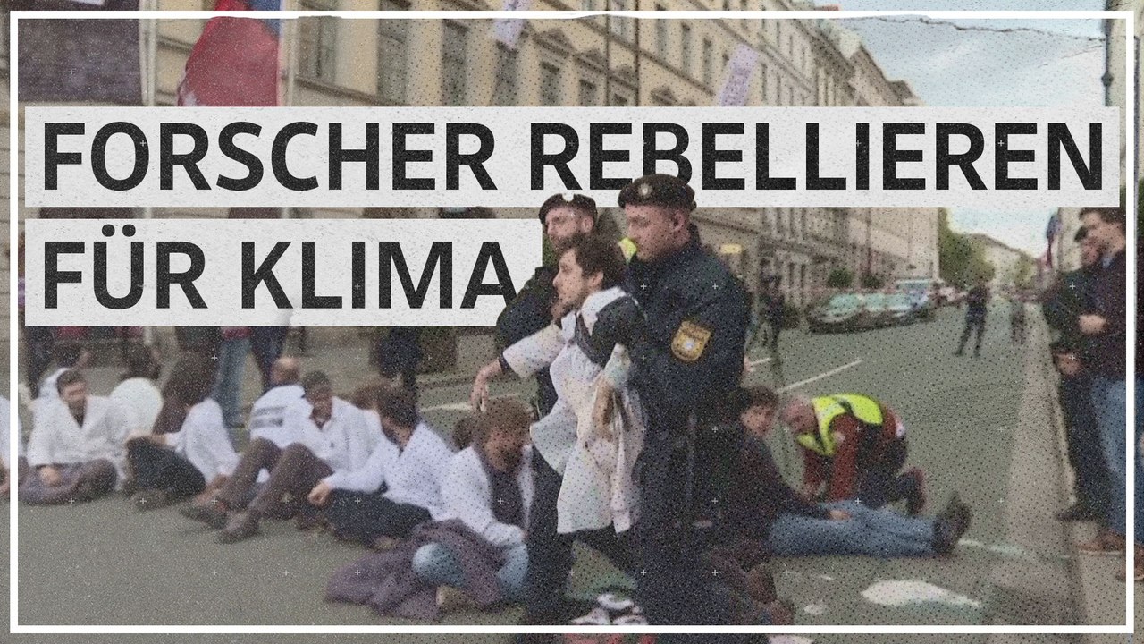Wissenschafter kleben sich für Klimaschutz an Münchner Odeonsplatz fest