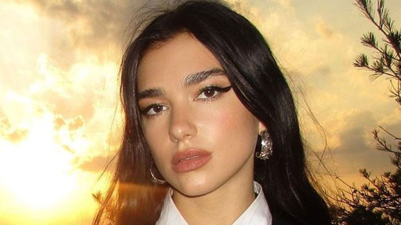Dua Lipa Layered a Collared Minidress With the Deepest Plunge Over a Matching Maxi Skirt