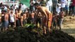 Indians celebrate the Hindu god Beereshwara Swamy with a cow dung fight