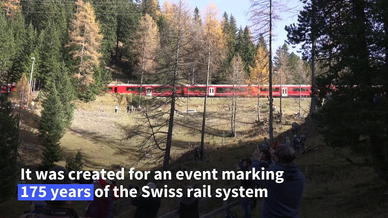World's longest passenger train winds through Swiss Alps