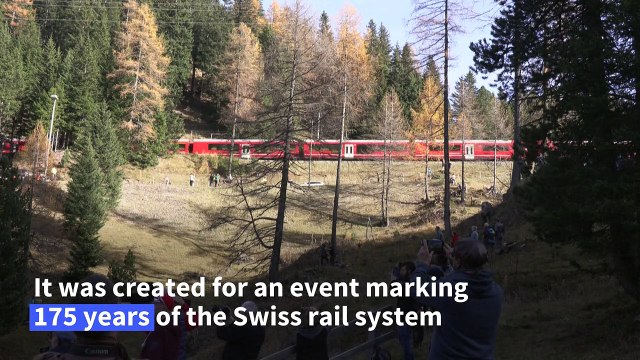 World's longest passenger train winds through Swiss Alps
