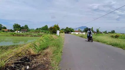morning walk in the village with a panorama of two mountains