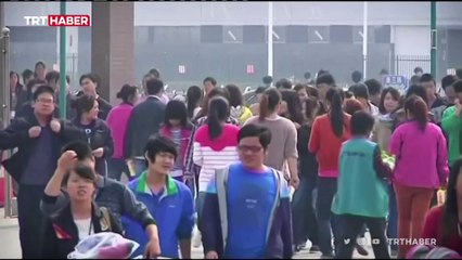 Çin'de karantinaya alınan fabrikanın işçileri kaçtı