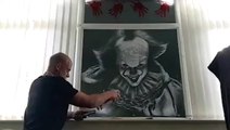 Father creates stunning Pennywise mural for Halloween using snow spray