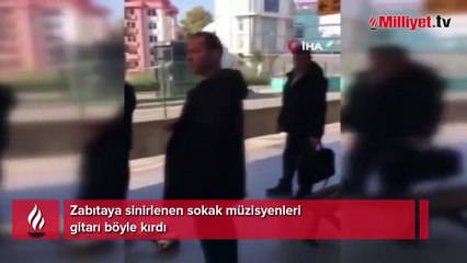 Zabıtaya sinirlenen sokak müzisyenleri gitarı böyle kırdı
