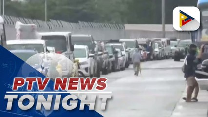 Long queue of vehicles outside Batangas Port seen early morning
