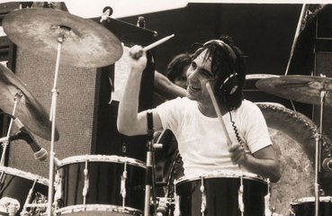 Bill Wyman said that drummer Keith Moon 'just threw' a cat at his girlfriend