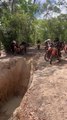 Dirtbiker Falls Into Mud