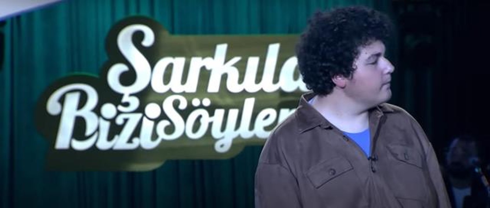 Kaan Kısaparmak kimdir? Kaan Kısaparmak kaç yaşında, nereli? Şarkılar Bizi Söyler Kaan Kısaparmak Eğilmem video izle!