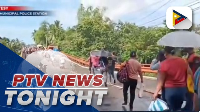 Temporary bridge being constructed over a damaged bridge in Iloilo