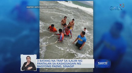 3 batang na-trap sa ilalim ng pantalan sa kasagsagan ng Bagyong Paeng, sinagip | Saksi