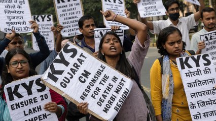 Protesters demand Gujarat state chief’s resignation after Indian bridge collapse