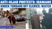 Iran: Young protesters knock turbans off clerics as part of anti-hijab protests | Oneindia News*News