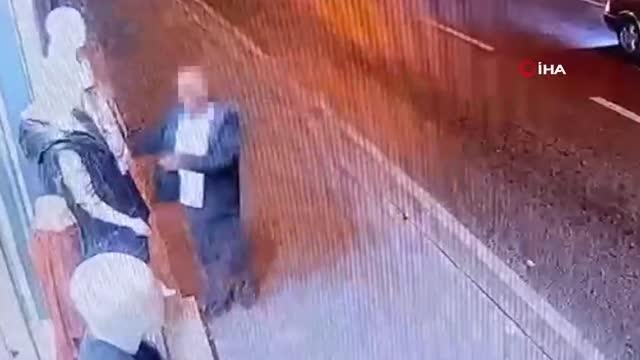 Mağaza önündeki mankenin üzerinden montu çalan hırsız kamerada