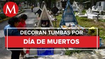 Familiares visitan a sus seres queridos en panteones de Nuevo León