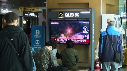 Crowds in Seoul watch news break of North Korean missile launches