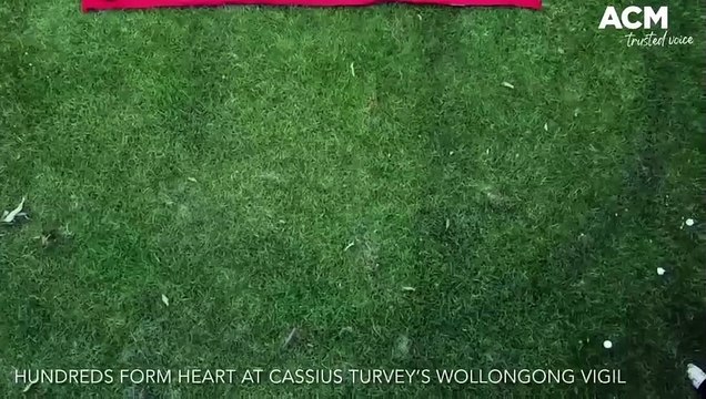 The masses formed a heart around candles at a Wollongong vigil for Cassius Turvey. Video supplied.