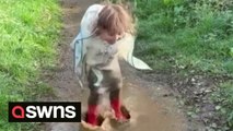 Three-year-old Peppa Pig fan is crowned the winner of the annual World Puddle Jumping Championships