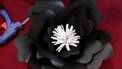 Backdrop Of Paper Flowers For Engagement