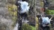 David v Goliath: Drone footage shows solitary Ukrainian paratrooper emerge from woods and destroy Russian tank at close range with ONE SHOT