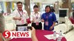 GE15: Candidates meet for a light moment at Tanjong nomination centre