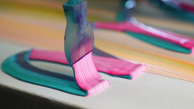 Nozzles extrude acrylic paint