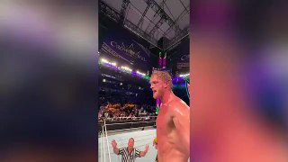 WWE - Logan Paul films POV footage as he jumps off top rope in Roman Reigns match