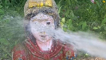 Restoring chipped snow white lawn statues