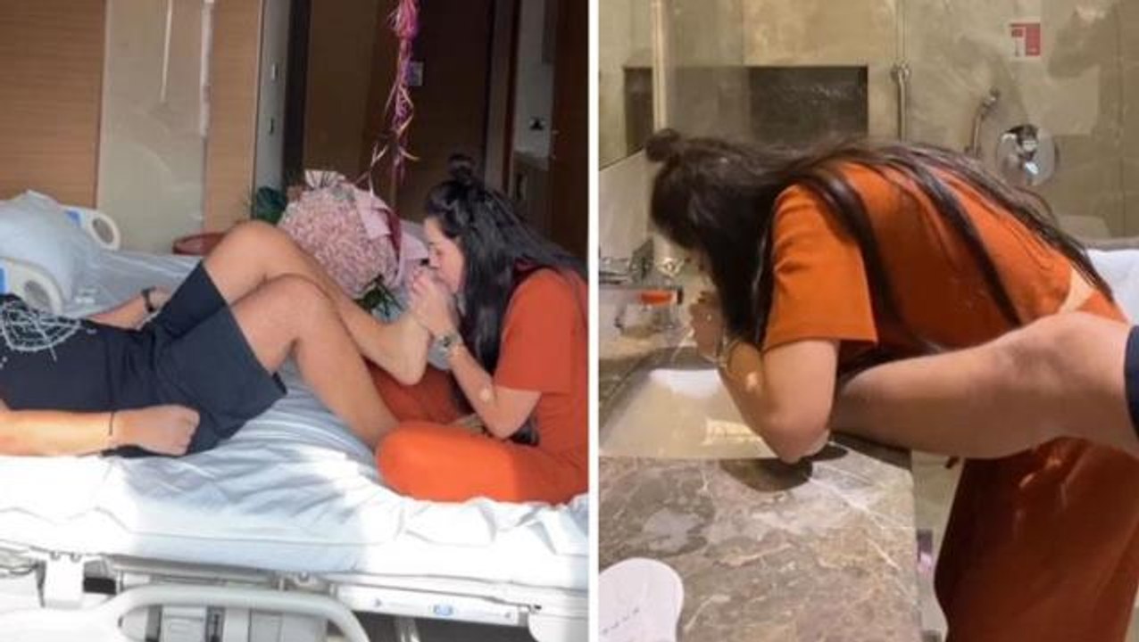 Erkek kadının ayağını öpüyor