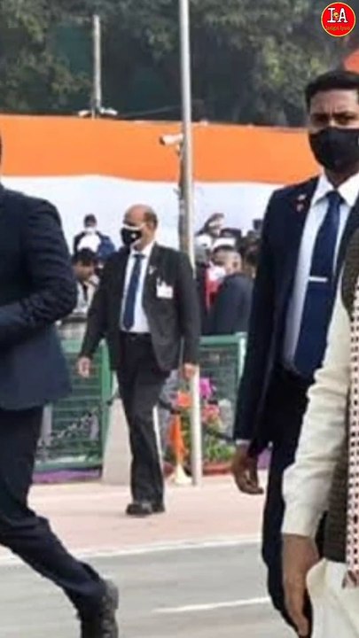 PM bodyguards black suitcases