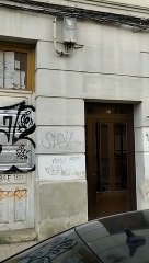 Tapiado provisional de los locales okupados de la calle Calvario