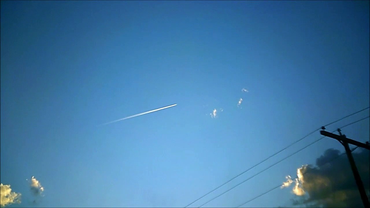 MCH 350 JET GOING 500 MPH OVER THE ALBERTA CANADA BLUE SKIES WITH JET STREAM .