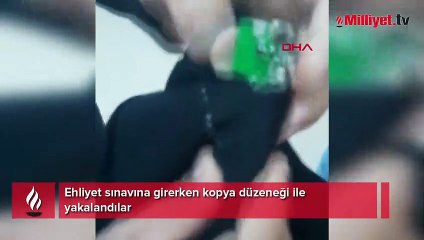 Download Video: İki kişi ehliyet sınavına kopya düzeneği ile girmeye çalıştı