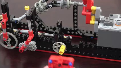 20 Mechanical Principles combined in a Useless Lego Machine