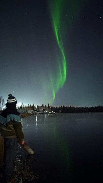 Rock Chirping Under Northern Lights