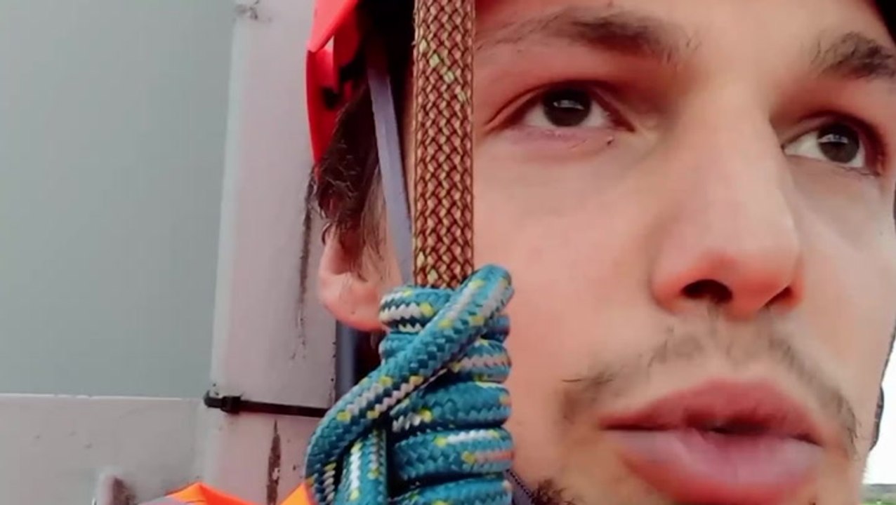 Just Stop Oil protester uses bike lock to chain neck to M25 gantry