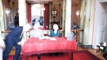 King Charles signs the visitors' book at Doncaster Mansion House