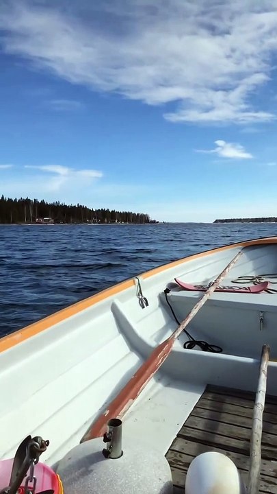 Man Fishes on Ice Block in the Middle of the Lake